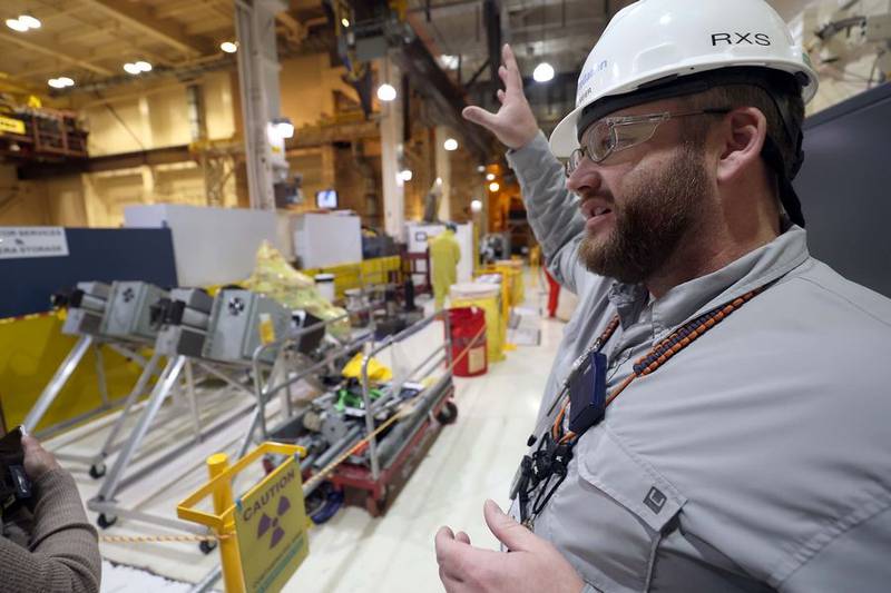 Eric Meier explains how they replace spent fuel at the Byron Generating Station Tuesday, Oct. 17, 2023, in Byron.