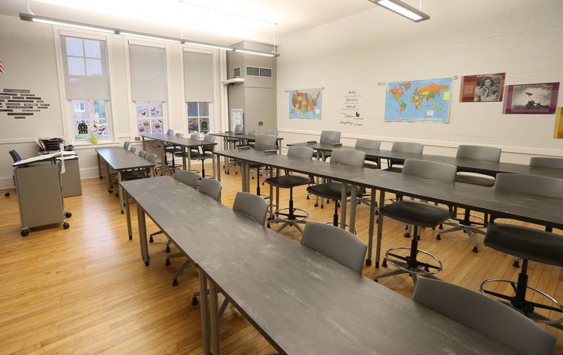 Desks are arranged in different elevations as part of a remodel on Friday, Oct. 6, 2023 at St. Bede Academy.