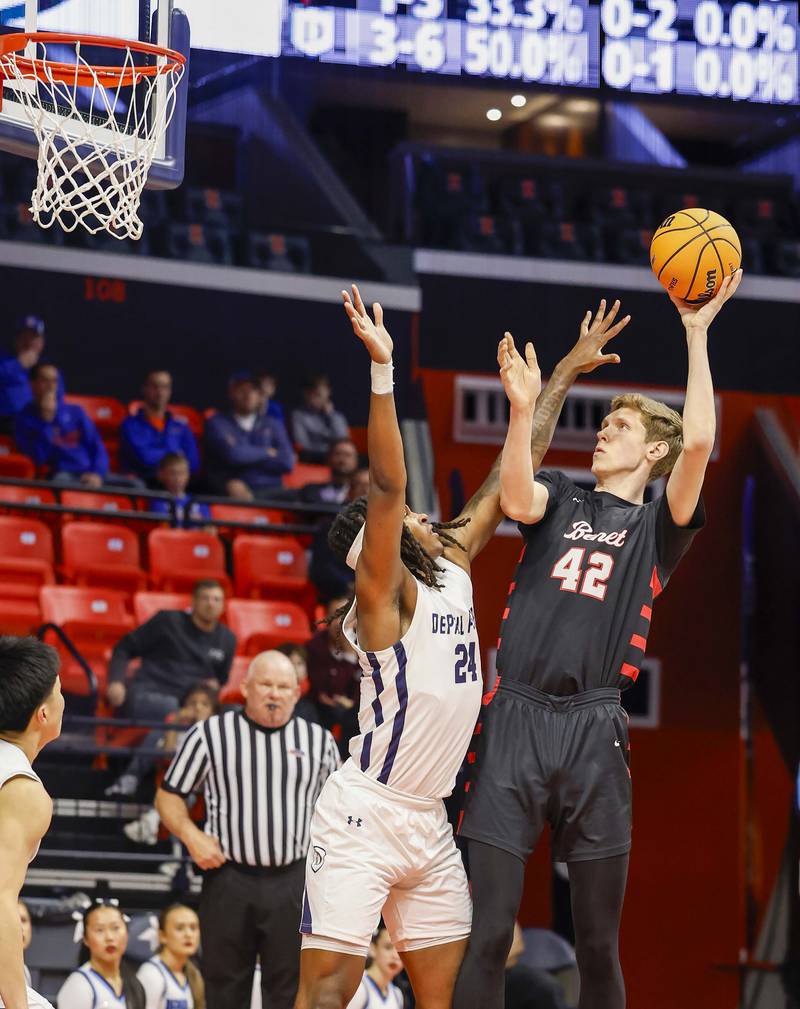 Benet’s Colin Stack (42) hooks a shot over DePaul College Prep's Rashaun Porter (24) during the IHSA Class 4A boys basketball state semifinal Friday, March 13, 2026 at the State Farm Center in Champaign.