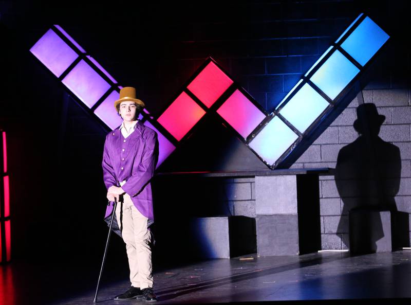 Willy Wonka, played by Mavrick Holocker, acts out a scene during a performance of Willy Wonka on Thursday, March 16, 2023 at Putnam County High School.