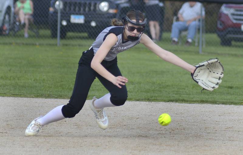 Woodland shortstop Addyson Ewing dives for a ground ball in the 5th inning during game against Streator Thursday at Woodland.