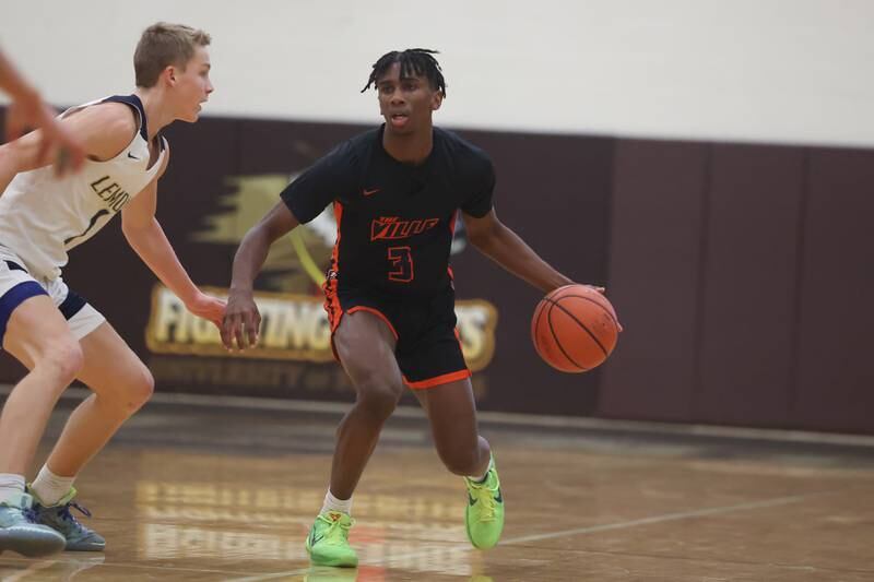 Romeoville’s Meyon Swansey looks for a play against Lemont in the WJOL Thanksgiving Classic Championship in Joliet on Saturday.
