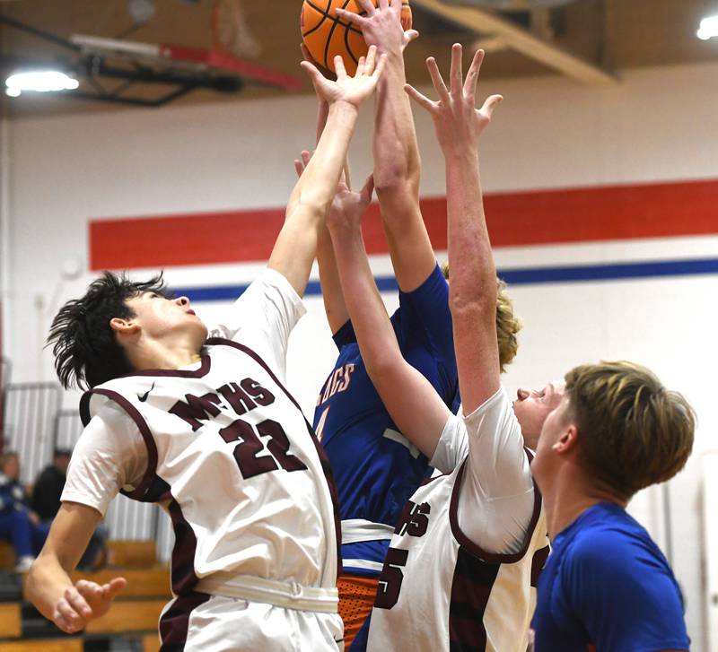 Marengo's Nick Jacobi (22) reaches for the ball during action against Genoa-Kingston on Monday, Nov. 24, 2025 at the Oregon Boys Basketball Thanksgiving Tournament in Oregon.