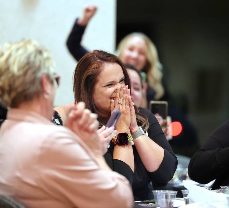 Cindy Green-Deutsch reacts as she is announced as the 2022 recipient of the Athena Award Tuesday, Oct. 18, 2022, during the Athena and Women of Accomplishment Award reception at the Barsema Alumni and Visitors Center at Northern Illinois University in DeKalb.
