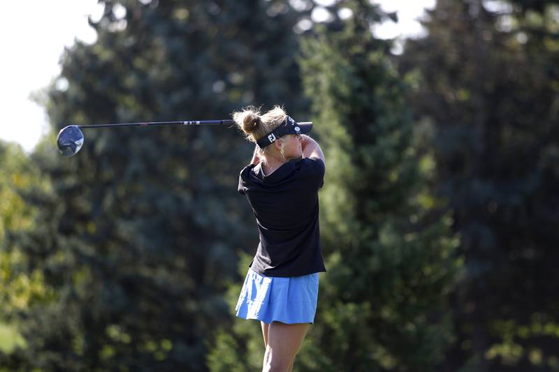 St. Charles North’s Abigail Gizewicz tees off during the Class 2A Waubonsie Valley Girls Golf Sectional on Monday, Oct. 6, 2025 at Springbrook Golf Course in Naperville.