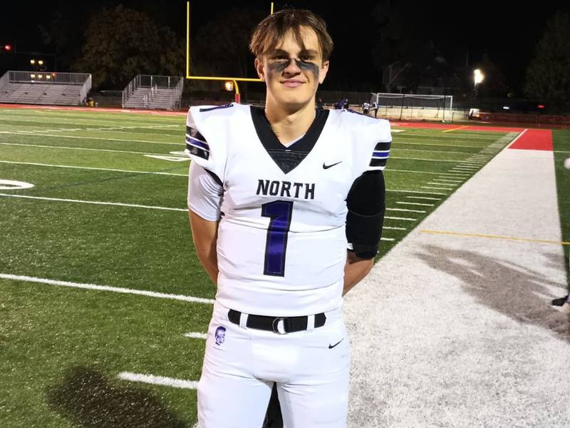 Downers Grove North junior quarterback Owen Lansu