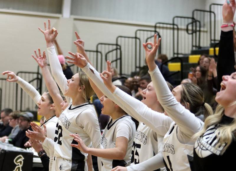 Kaneland’s Knights celebrate a Kyra Lilly three-point shot in IHSA Class 3A Regional Title Game girls basketball action on Friday, Feb. 21, 2025, at Crystal Lake South High School in Crystal Lake.