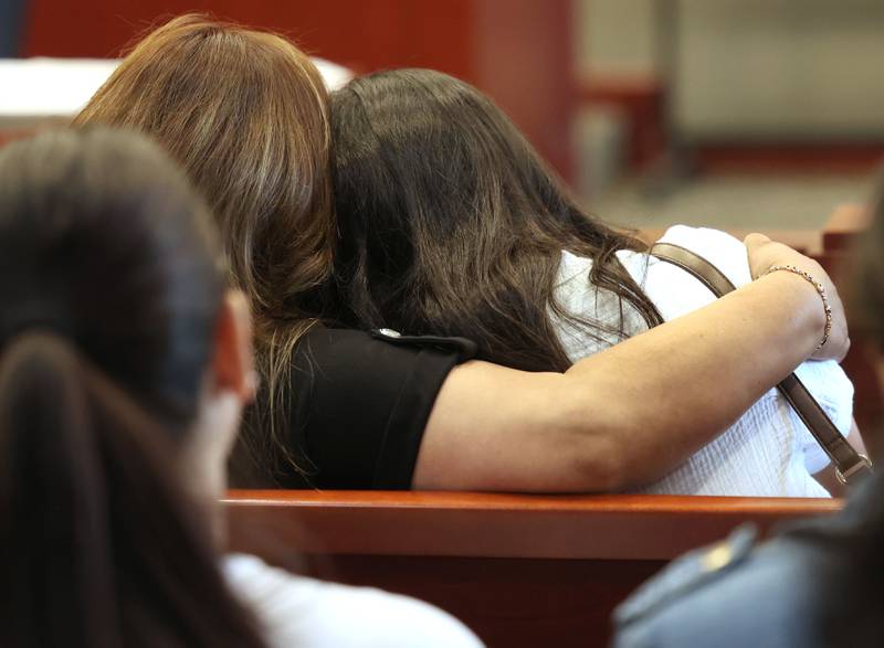 Family members of Graciela Reza Contreras embrace after the sentencing of James Corralejo Thursday, July 17, 2025, at the DeKalb County Courthouse in Sycamore. Corralejo was sentenced to four years in prison for a Class 2 felony count of driving under the influence of alcohol causing death for a 2023 crash that killed Reza Contreras.