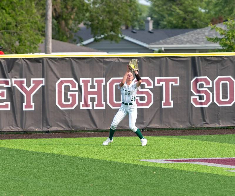 St. Bede center fielder Emma Slingsby camps under a fly ball in Friday's sectional softball championship game in Chillicothe.