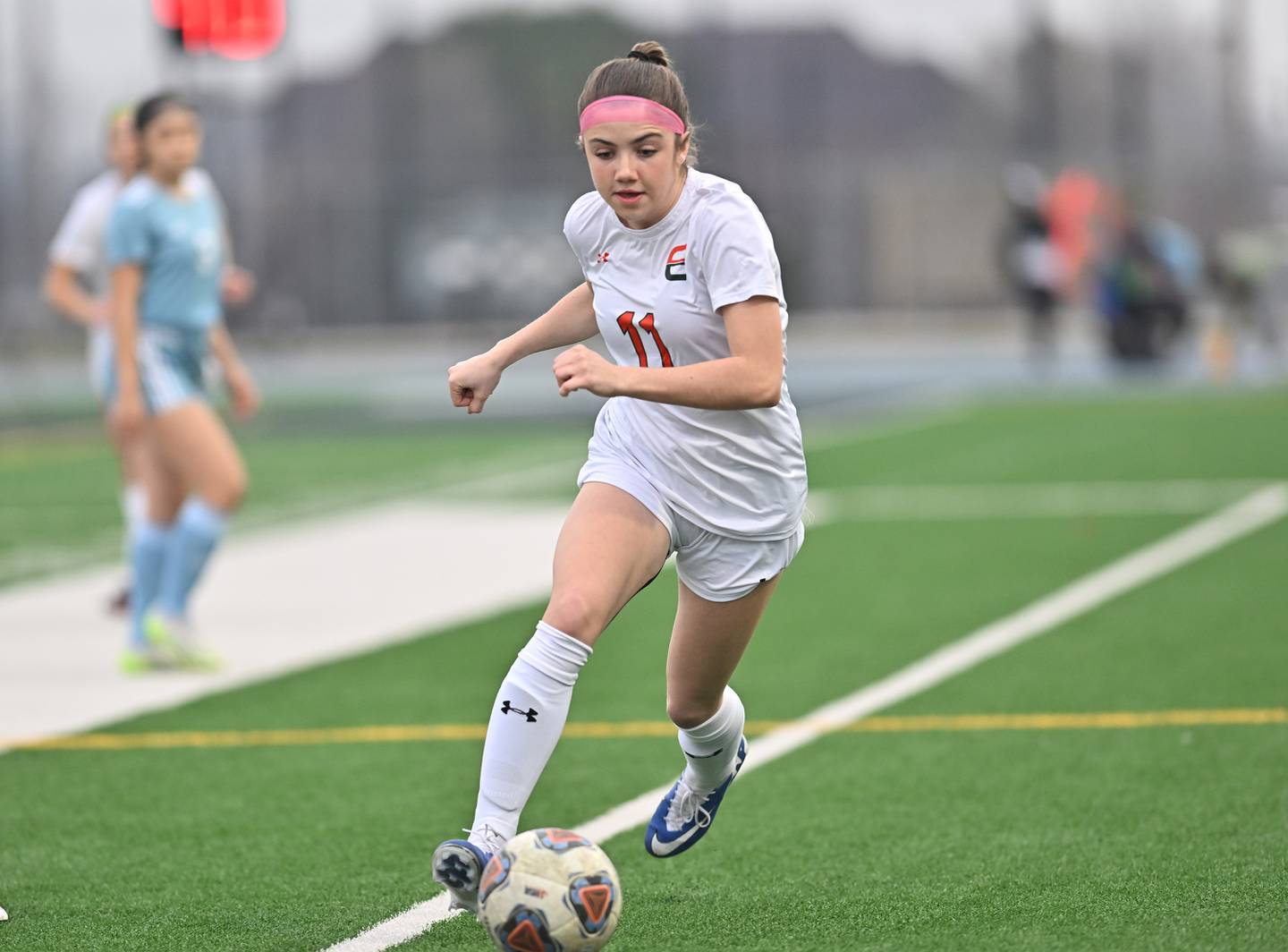 Plainfield East's Caroline Dinnon dribbles the ball during the non-conference game against Joliet Catholic on Wednesday, March. 13, 2024, at Joliet.