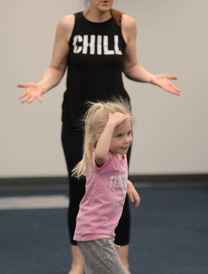 Children including Alice Manuel of La Grange Park participate in Earth Day Yoga at La Grange Park Library Sunday April 13, 2025. The event was held to celebrate Earth Day and was taught by Leah Vaughan