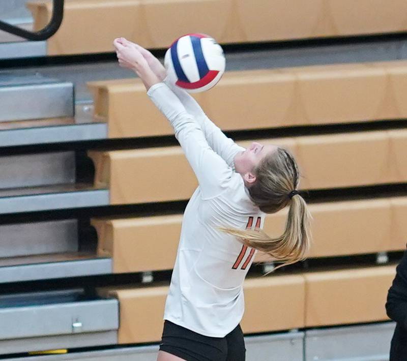 Lincoln-Way West's Laney Tuttle (11) set the ball against Joliet West during a class 4A Oswego Sectional semifinal match at Oswego High School on Monday, Oct. 30, 2023.