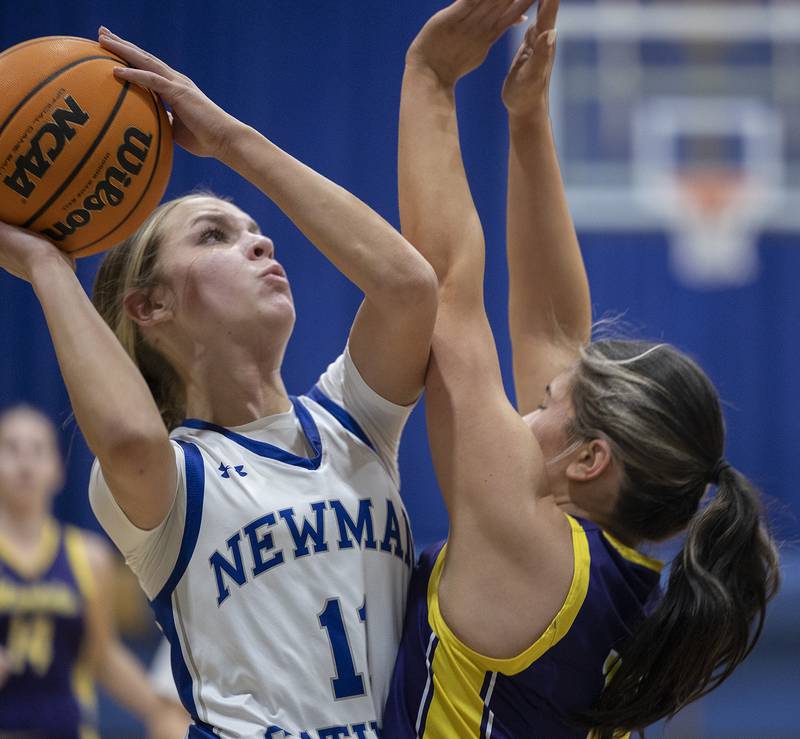 Newman’s Grace King puts up a shot against Mendota’s Ella Martin Thursday, Jan. 23, 2025.