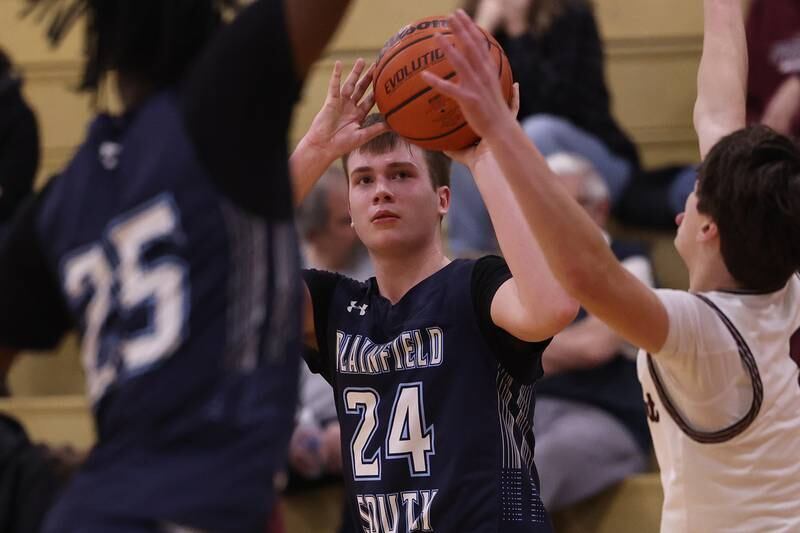 Plainfield South’s Nolan Gerdich takes the three point shot against Lockport on Wednesday January 25th, 2023.