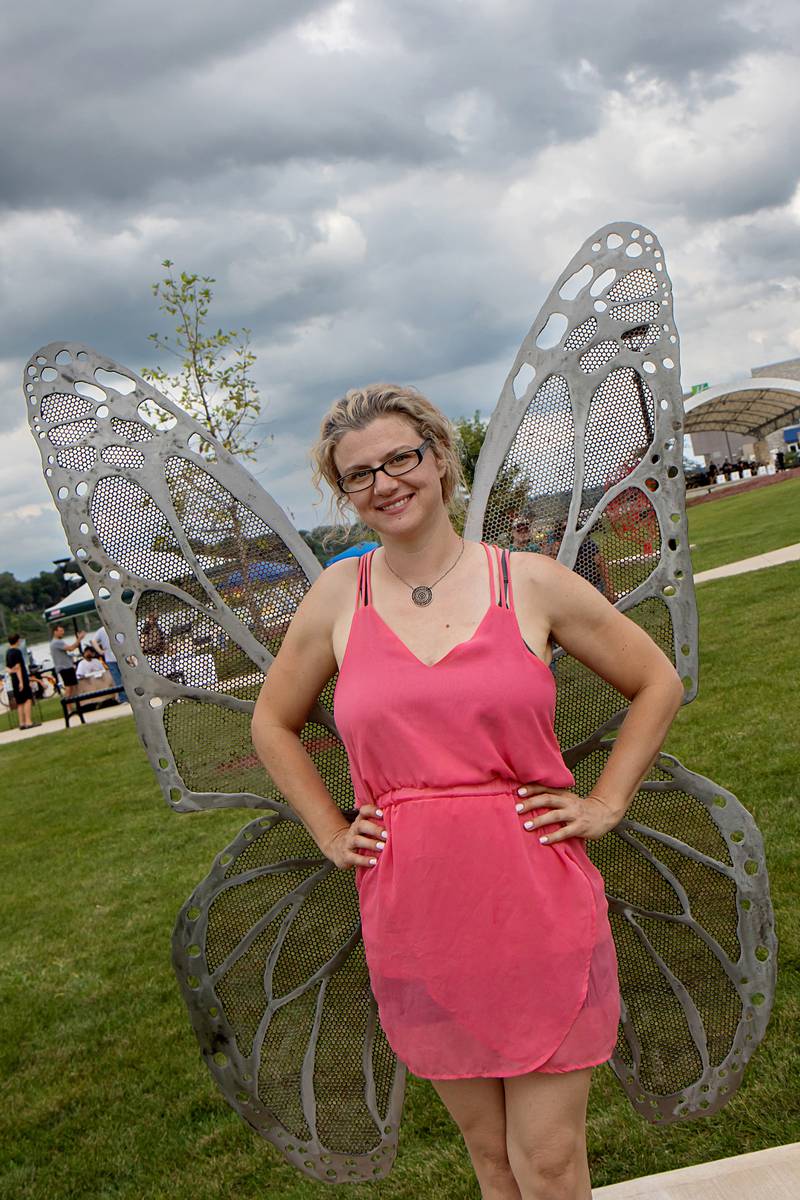 Crystal Blue of Sterling stands in front of her sculpture “Metempsychosis” at the fifth annual Rock Falls Tourism Art in the Park Sculpture Walk, where a new crop of sculptures was  unveiled at RB&W Park on Saturday, Sept. 3, 2022. The works will be on display for a year before new ones are installed.
