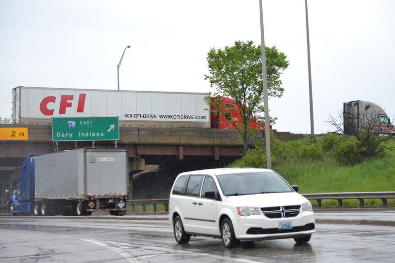 Traffic flows along Interstate 80, over Chicago Street in Joliet, as workers patch a hole that formed in the bridge. Gov. JB Pritzker's proposed capital plan includes $1 billion for I-80.