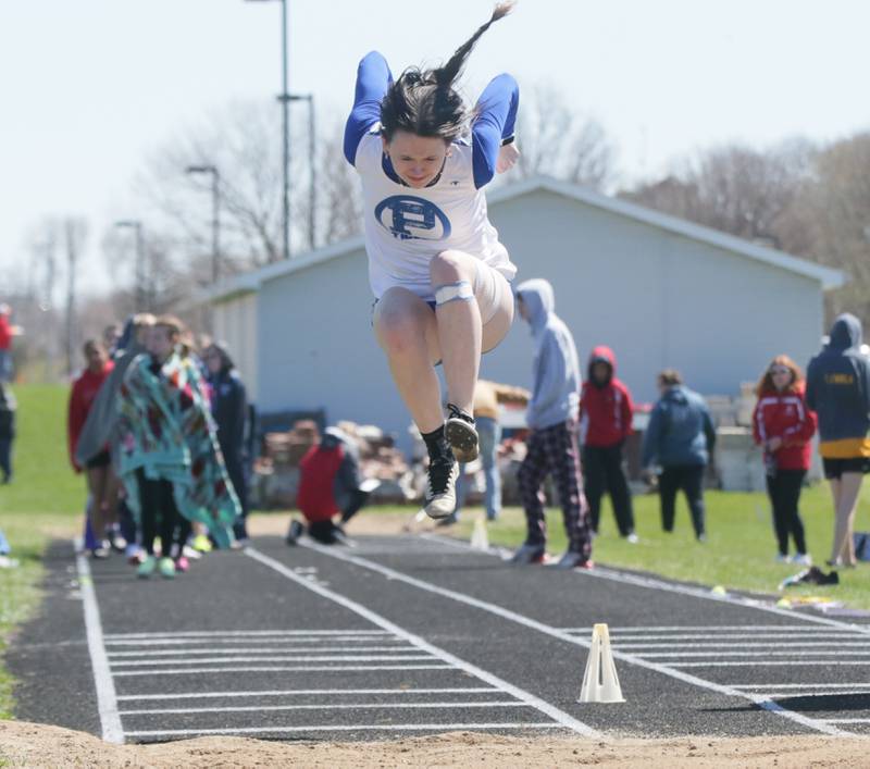 Princeton's Graycee Funderberg does the long jump during the Rollie Morris Invite on Saturday, April 16, 2022 at Hall High School in Spring Valley.