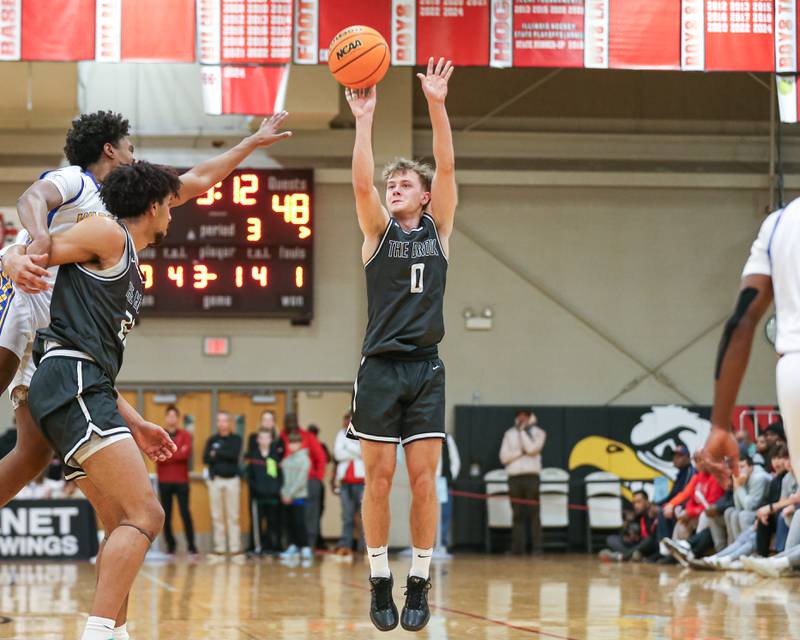 Bolingbrook's Trey Brost (0) shoots a jumper during their When Sides Collide Shootout basketball tournament matchup between Warren and Bolingbrook. Jan 25, 2025 in Lisle.