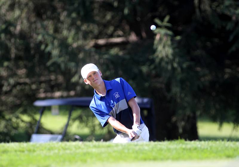 Geneva’s Austin Frick hits onto the green during the DuKane Conference Boys Golf Tournament at Bartlett Hills Golf Club on Tuesday, Sept. 20, 2022.