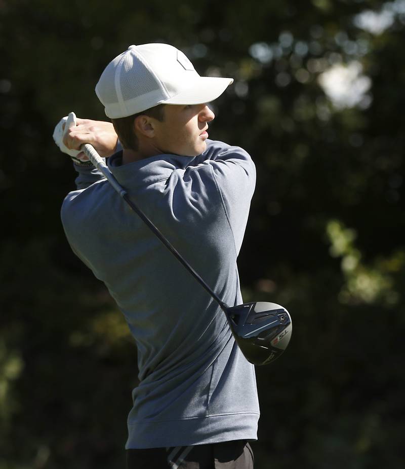 Crystal Lake South’s Nate Stewart watches his tee shot on the ninth hole during the IHSA 2A Marengo Regional Golf Tournament Wednesday, Sept. 28, 2023, at Marengo Ridge Golf Club.