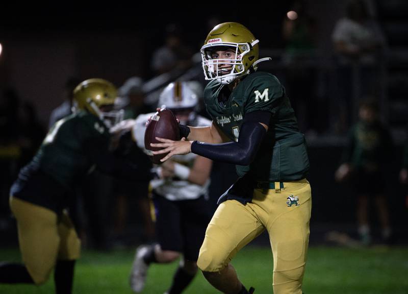 Bishop McNamara's Karter Krutsinger looks for an open man  in a game against Chicago Christian on Friday, September 19, 2025.