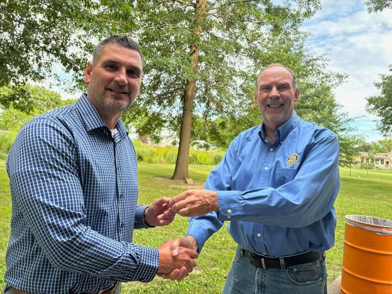Rock Falls Rotary Past President Bob Sondgeroth (right) inducted Shane Brown (left) as the incoming Rock Falls Rotary president at Rotary Park in Rock Falls on Monday evening, July 1. Brown received the President’s lapel pin Sondgeroth as past president was given his completion of Paul Harris Fellow+ 2 Foundation pin with two sapphires in appreciation of his year of service.