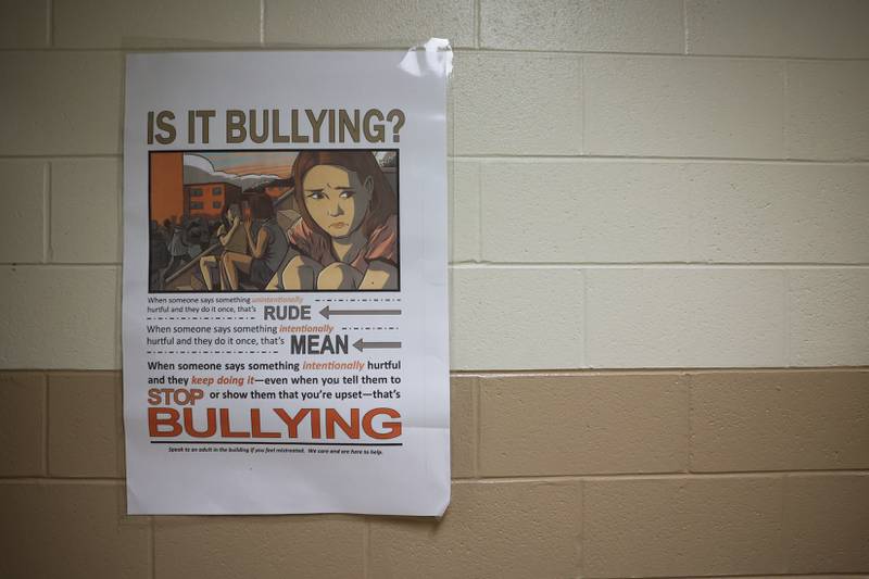 A sign against bullying hangs on the wall in the hallway on the first day of school at Woodland Elementary School in Joliet. Wednesday, Aug. 17, 2022, in Joliet.