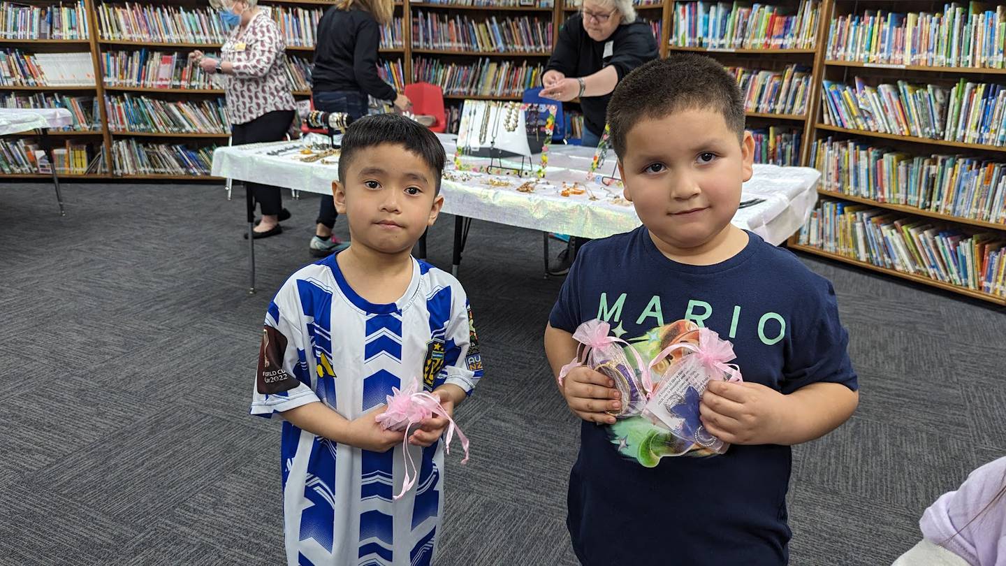 On April 15, volunteers from two Joliet nonprofits – the Zonta Club of Joliet and Visitation and Aid Society – hosted a “jewelry gift shop” of gently used bracelets earrings, necklaces for the students at Edna Keith, M.J. Cunningham Elementary, and Sator Sanchez and Thomas Jefferson elementary schools to give on Mother’s Day. Kyle Ly (left) and Tony Bonilla (right) show off their "purchases."