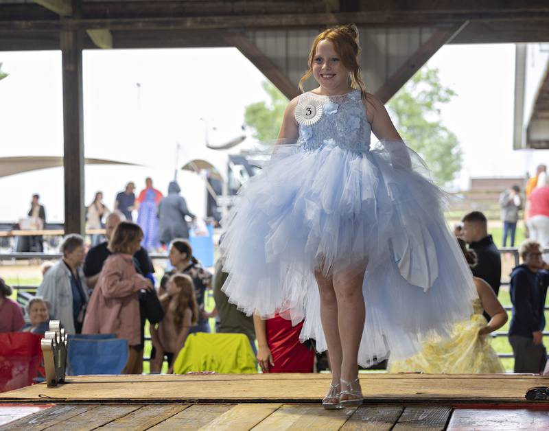 Raya Windham, 9, competes in the Ogle County Young Miss pageant Thursday, July 30, 2025, at the Ogle County Fairgrounds.