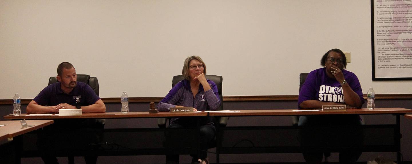 From left, Brandon Rogers, vice president; Linda Wegner, president; and Linda LeBlanc-Parks, secretary at a special meeting of the board of education to approve a naming request for Mark Dallas Way on Monday, May 22, 2023.