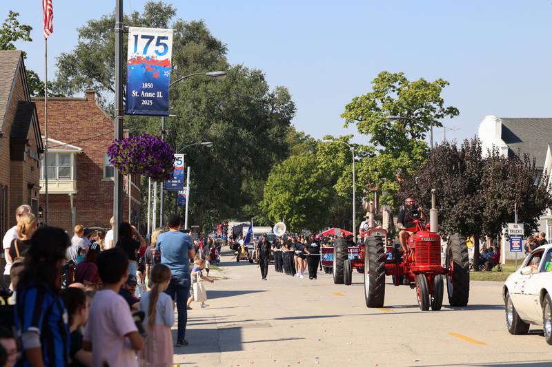 The Grand Pumpkin Parade reaches downtown St. Anne along Station Street during the St. Anne Pumpkin Festival on Saturday, Oct. 4, 2025.