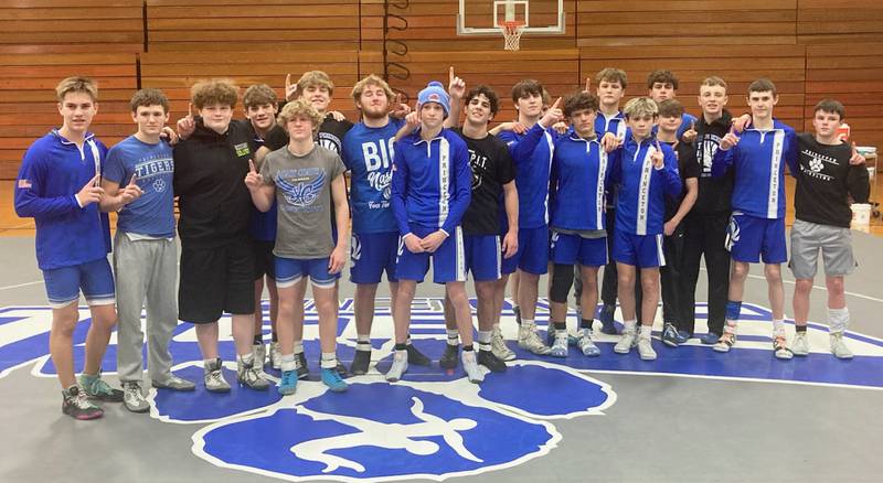 The Princeton Tigers wrestling team defeated Rockridge and Sherrard on the Prouty Gym mats Friday, clinching their first conference championship in 14 years.