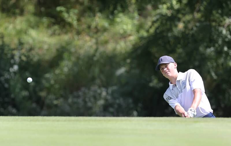 Geneva's Austin Frick chips onto the 7th green Monday, Aug. 22, 2022, during the Mark Rolfing Cup at Kishwaukee Country Club in DeKalb.