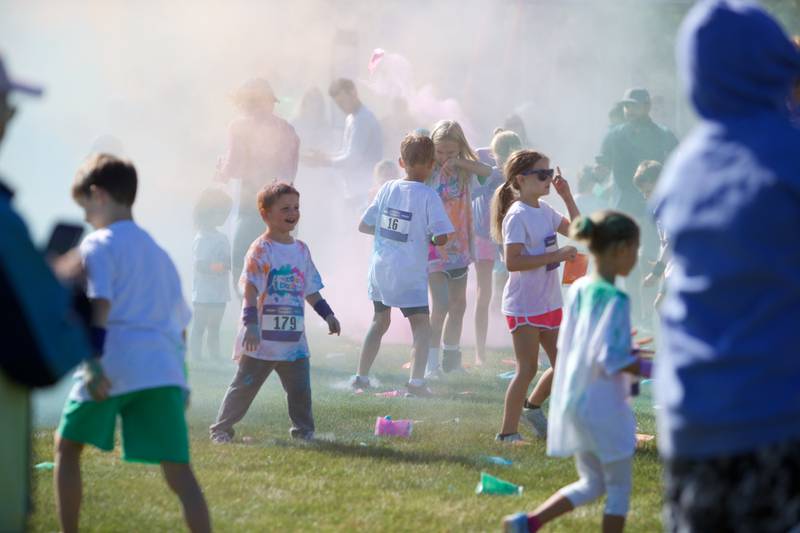 Kids get some color on prior to the Glen Ellyn 2K Kids Color Bash Run on Saturday Aug.10, 2024 at Ackerman Park in Glen Ellyn.