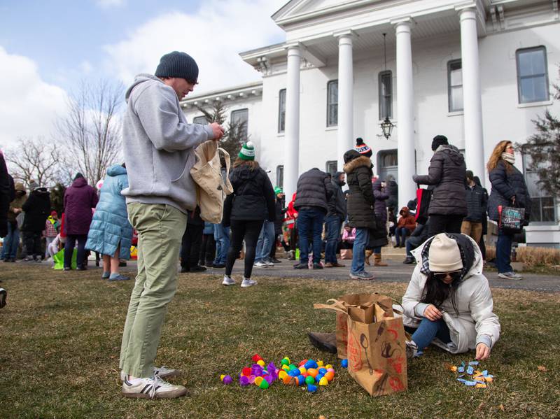 John McGrath, left, of Elmhurst checks his raffle tickets during the Elmhurst Park District's Adult Easter Egg Hunt at Wilder Park on Saturday, March. 18, 2023. Attendees were able to win various prizes from local sponsors with the raffle tickets in the Easter eggs.
