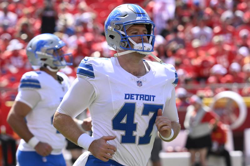 Detroit Lions long snapper Scott Daly comes onto the field for the first half of an NFL football game against the Kansas City Chiefs, Saturday, Aug. 17, 2024 in Kansas City, Mo. (AP Photo/Reed Hoffmann)