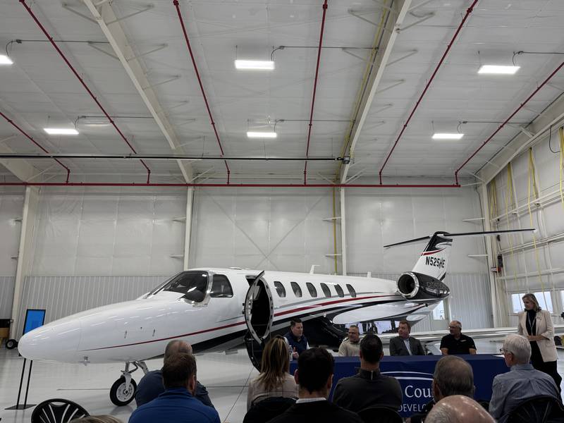 Morris Mayor Chris Brown, D14 Aviation Owner Chris Ratliff, Airport Manager Ryan Cryder, and private pilot Tim Kolster talk Thursday at the Grundy Economic Development Council's bus tour. Photo taken Thursday, Nov. 20, 2025.