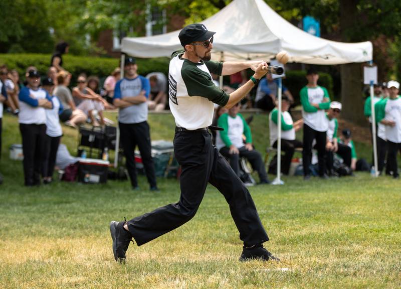 Zack LoCicero hits a ball during the Elmhurst Heritage Foundation's Vintage Baseball Game at Elmhurst University Mall on Sunday, June 4, 2023. Both teams from the city of Elmhurst and Elmhurst University played with baseball rules from 1850.