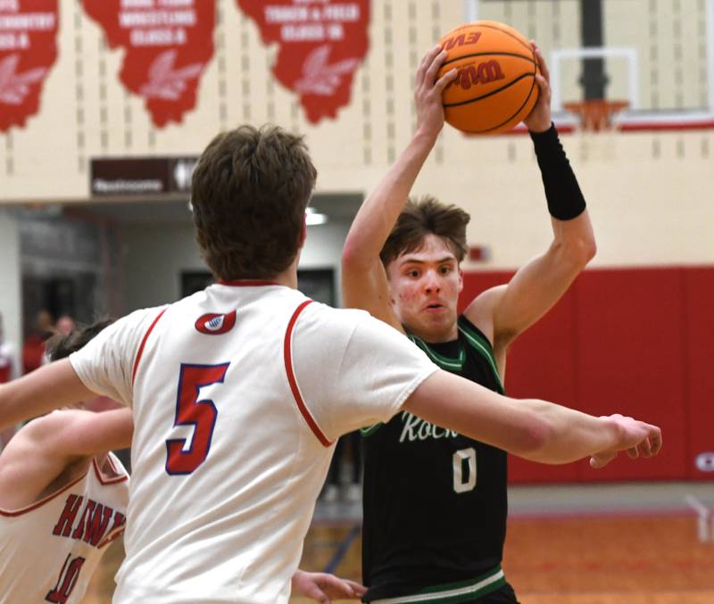 Rock Falls' Max Burns (0) drives to the basket as Oregon's Tucker O'Brien (5) defends on Friday, Jan. 9, 2026 at the Blackhawk Center in Oregon.