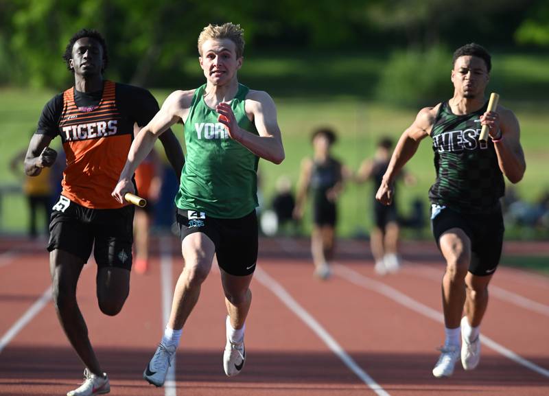 York anchor Austin Cello, middle, sprints for the finish line as the Dukes win the 400-meter relay during the Class 3A Lake Park boys track and field sectional on Friday, May 23, 2025 in Roselle.