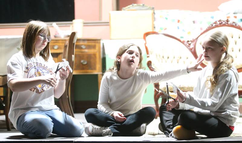 Mary, played by Emilia Farrier; Helen Keller played by Poper Mitchell and Martha, played by Poper Forrest rehearse a scene during "The Miracle Worker" on Thursday, March 21, 2025 at Stage 212 in La Salle.