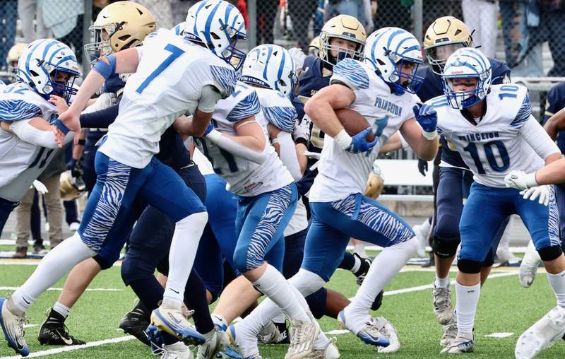 Princeton's Casey Etheridge runs against Bloomington Central Catholic in Saturday's 3A playoff opener in Bloomington. He rushed for 146 yards and finishes his career ranked No. 18 all-time in the IHSA with 5,345 yards.
