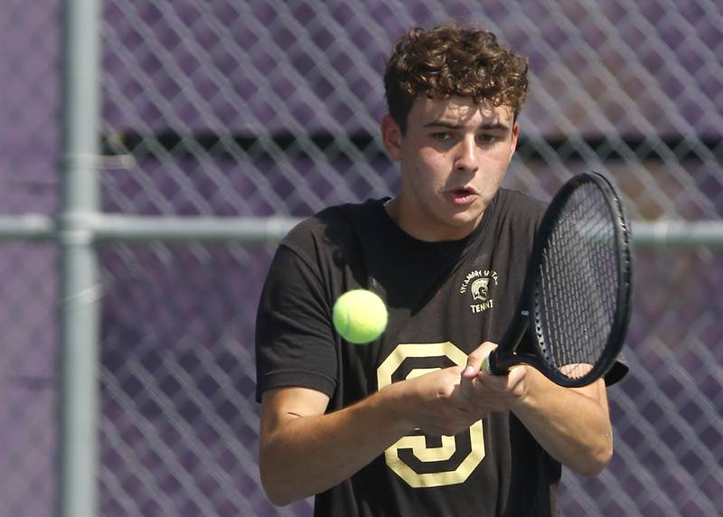 Sycamore's Liam Kerbel returns the ball as he competes in the Class 1A Boys Doubles State Tennis Tournament on Thursday, May 23, 2024, at Rolling Meadows High School in Rolling Meadows.