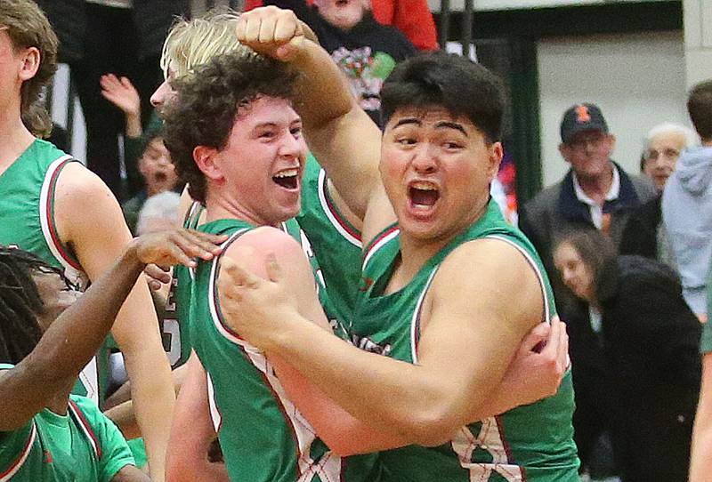 L-P's Mikey Hartman and Andy Medina react after defeating Streator to win the Class 3A Regional title on Friday, Feb. 28, 2025 in Sellett Gymnasium at L-P High School.