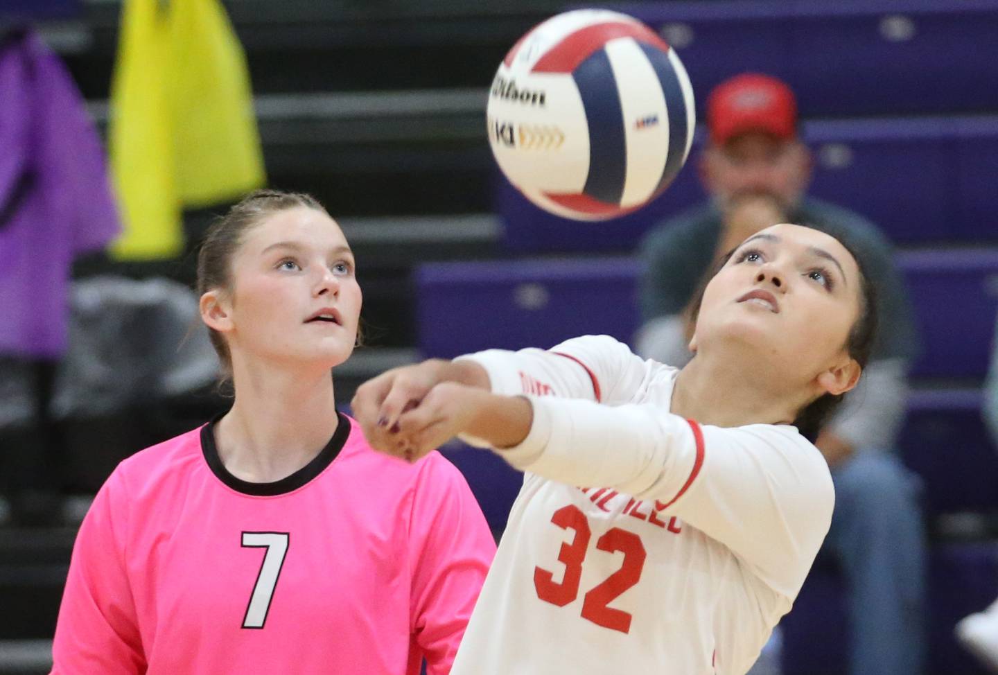 Earlville libero Elizabeth Vazquez bumps the ball back to the Parkview Christian side of the net as teammate Bailey Miller looks on during the Class 1A Regional semifinal game on Monday, Oct. 28, 2024 at Serena High School.