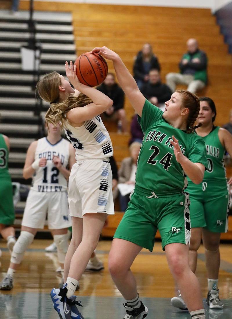 Rock Falls' Peyton Smit (24) stuffs Bureau Valley's Taylor Neuhalfen in Saturday's regional game at the Storm Cellar.