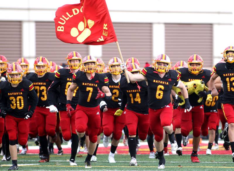 Batavia players take the field before their Class 7A second-round playoff game in Batavia against Hersey on Saturday, Nov. 5, 2022.