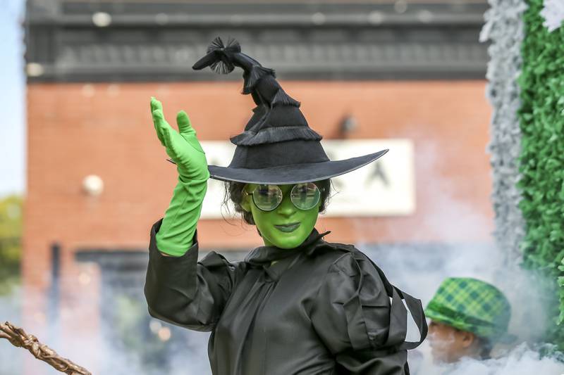 A Wizard of Oz character rides on the Indian Trails float in the Plainfield Homecoming parade Saturday, Sept 20, 2025.