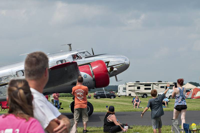 The pilot for a Lockheed 12A Junior taxies to the runway Saturday, July 24, 2021 to start his flyover at the ACCA Air Show at Whiteside County Airport.