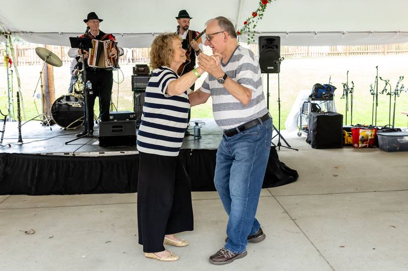 Doris Stack of Chicago and Tom Zielinski of Grayslake dance to the music of Ray Koncar & The Boys at the Slovenian Grape Harvest Festival on Sept. 29, 2024.